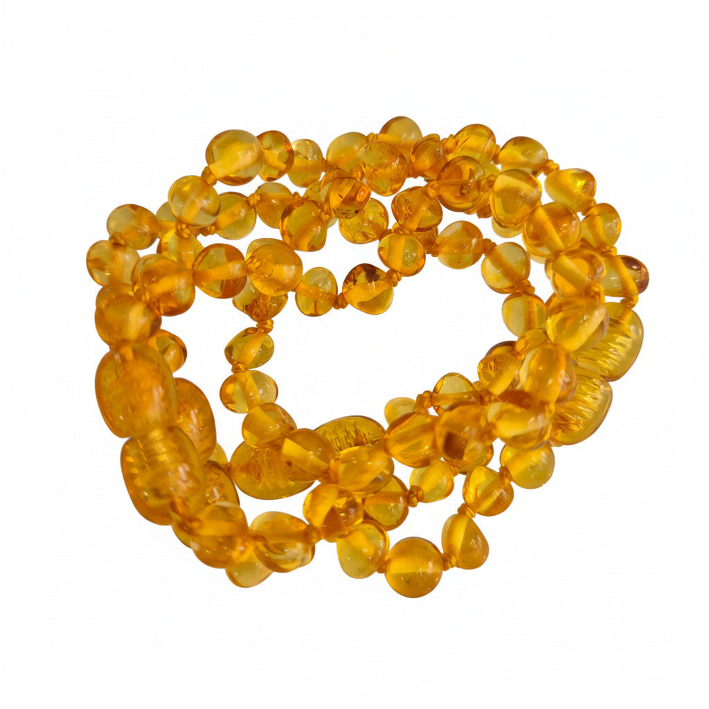 amber beaded bracelet for babies on a white background