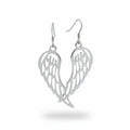 Pair of silver wing-shaped earrings on a beige background