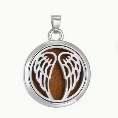 Silver pendant with angel wings design on a white background