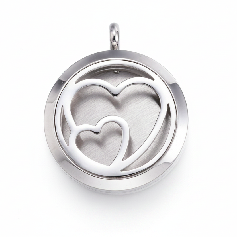 Silver heart-shaped pendant on a white background