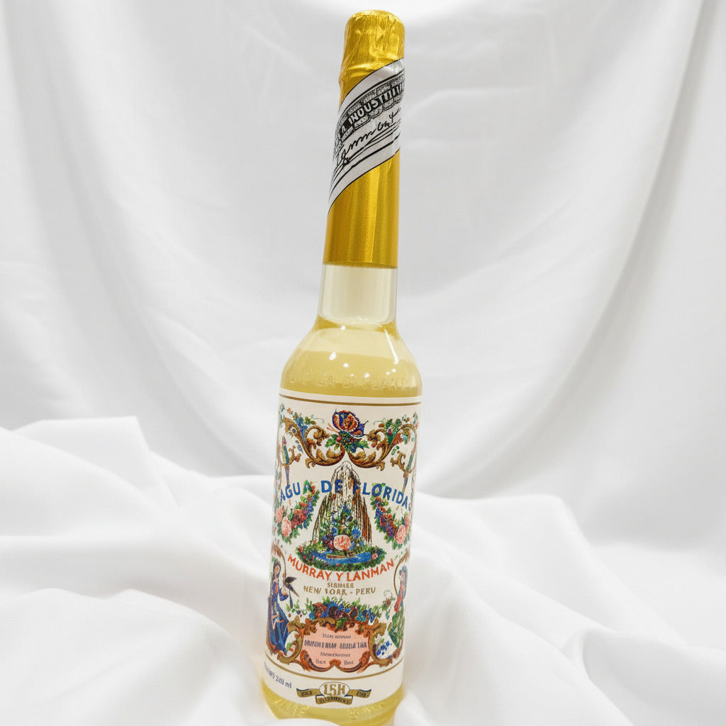 Bottle of Florida water on a white fabric background
