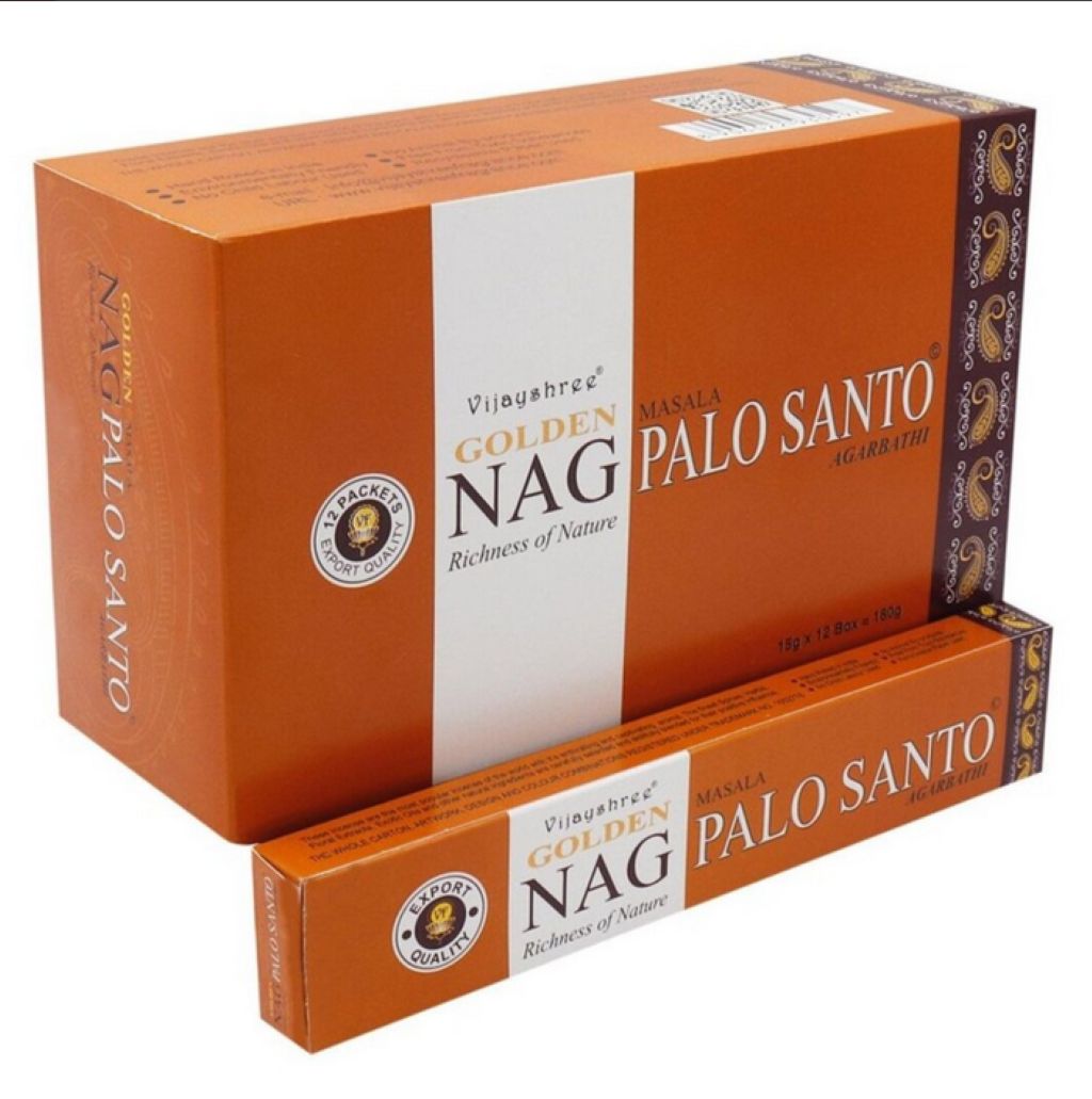 Orange packaging of Golden Nag Masala Palo Santo incense sticks on a white background