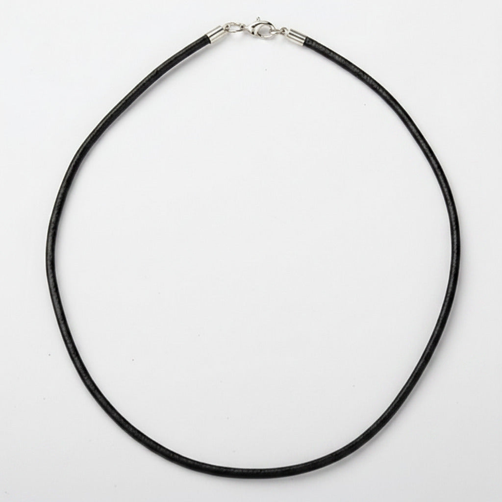 Black necklace with a silver clasp on a white background
