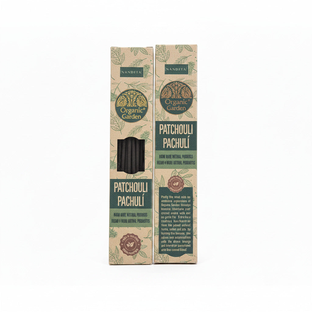 Two boxes of Organic Garden Patchouli candles on a white background