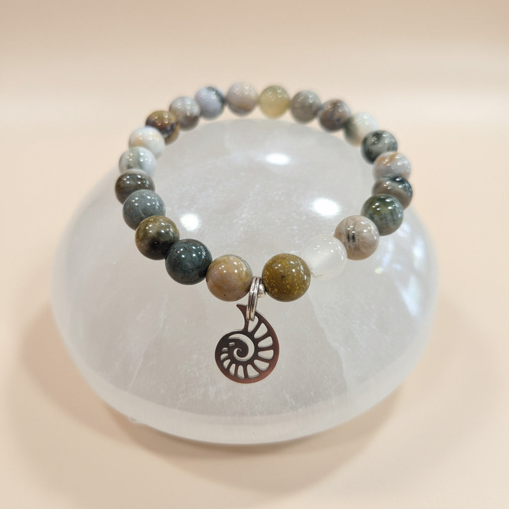 Jasper Beaded bracelet with a spiral charm on a clear stone