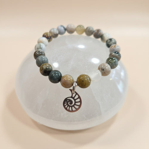 Jasper Beaded bracelet with a spiral charm on a clear stone