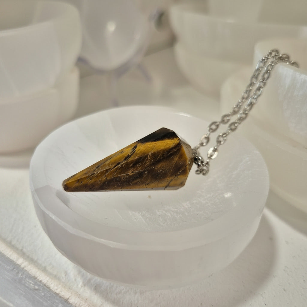 Tiger eye pendulum on a chain with a chain