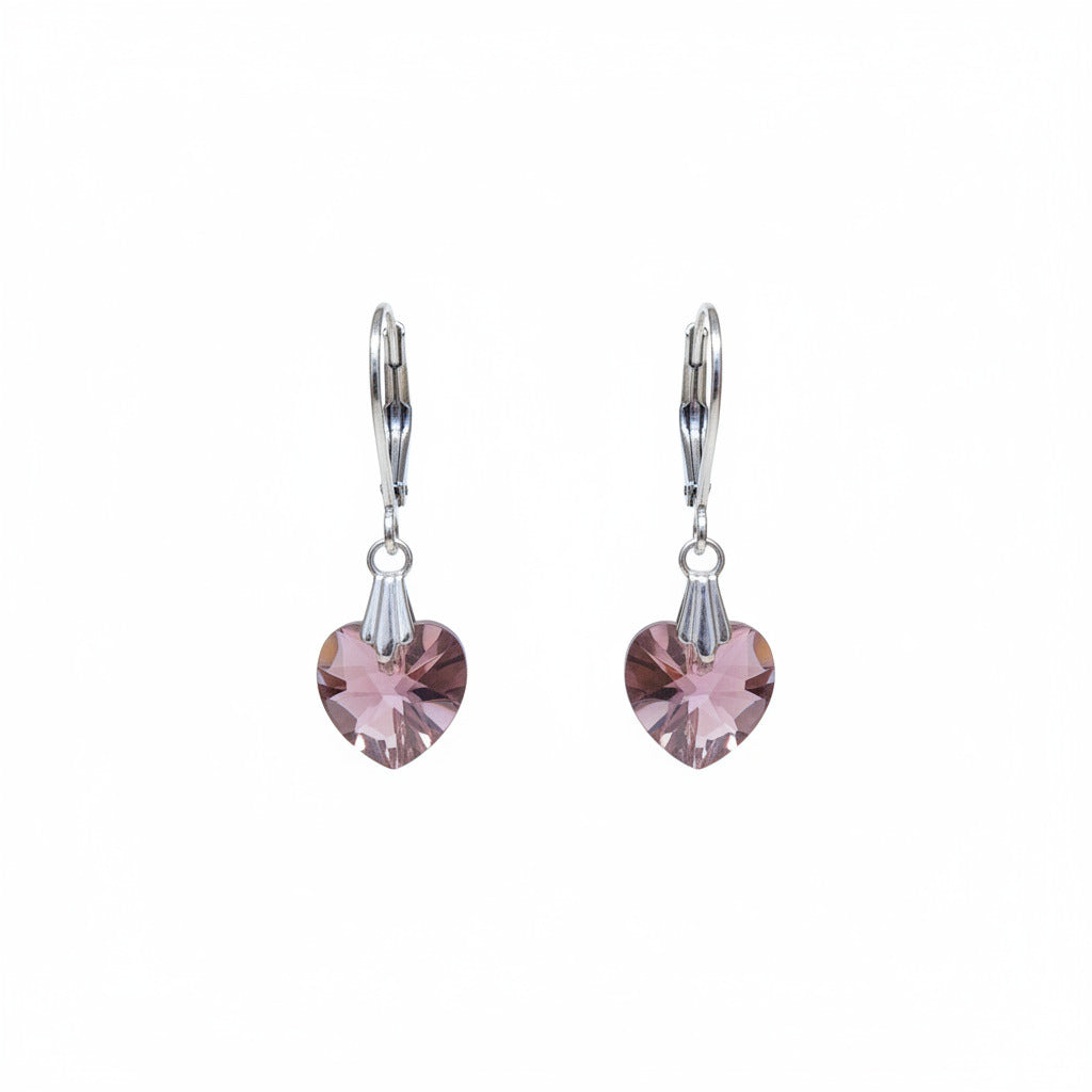 Heart-shaped purple earrings on a white background