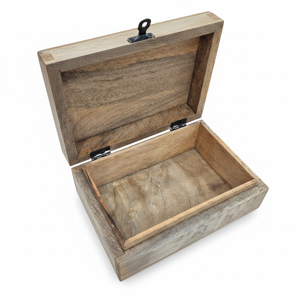 Wooden box with a lid open on a white surface