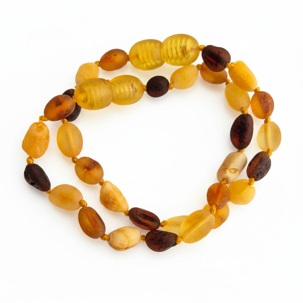 bracelet with amber beads on a white background