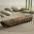 Amalur bamboo sound system  on a sand and stone surface with zen background