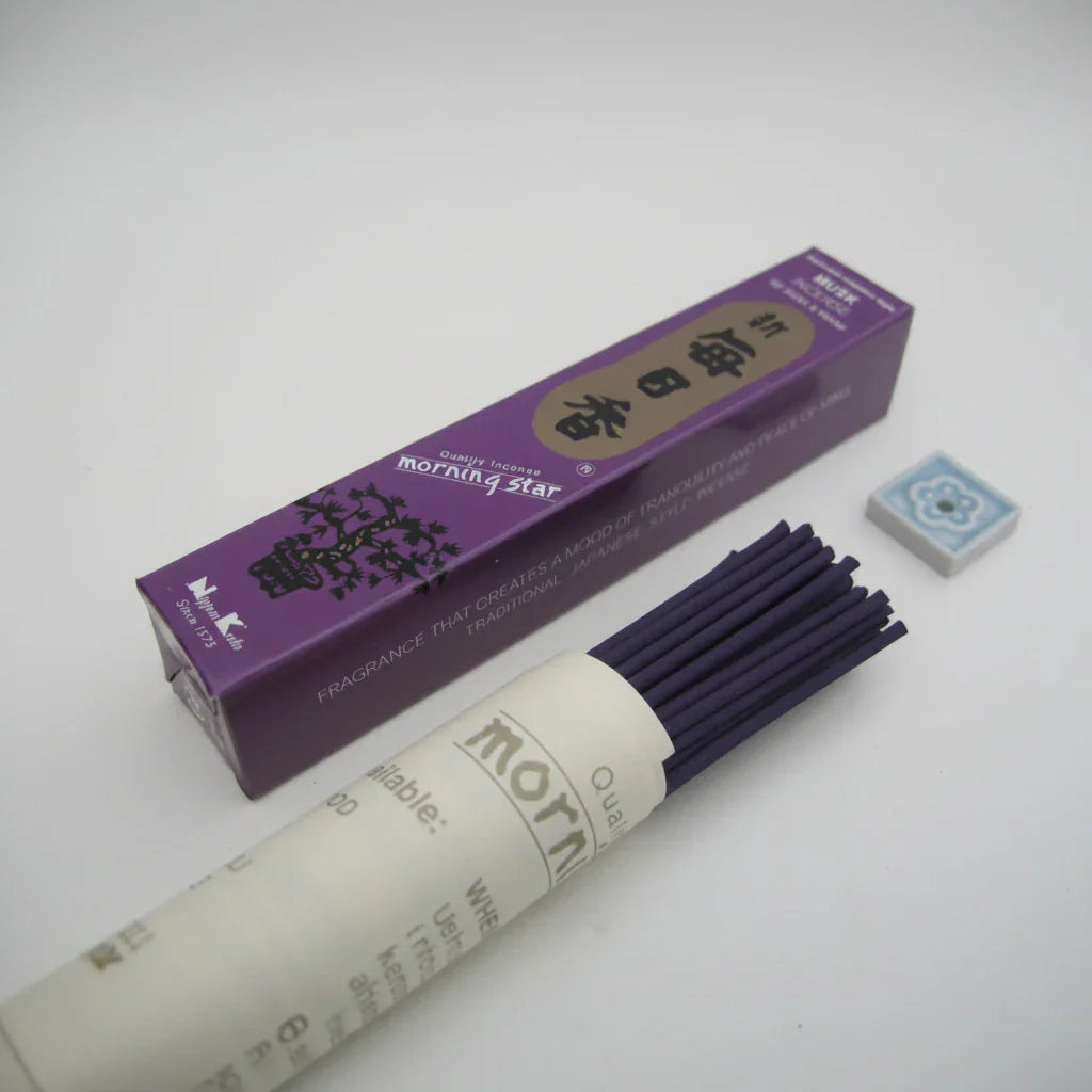 Incense sticks with packaging labeled 'Morning Star' on a white background