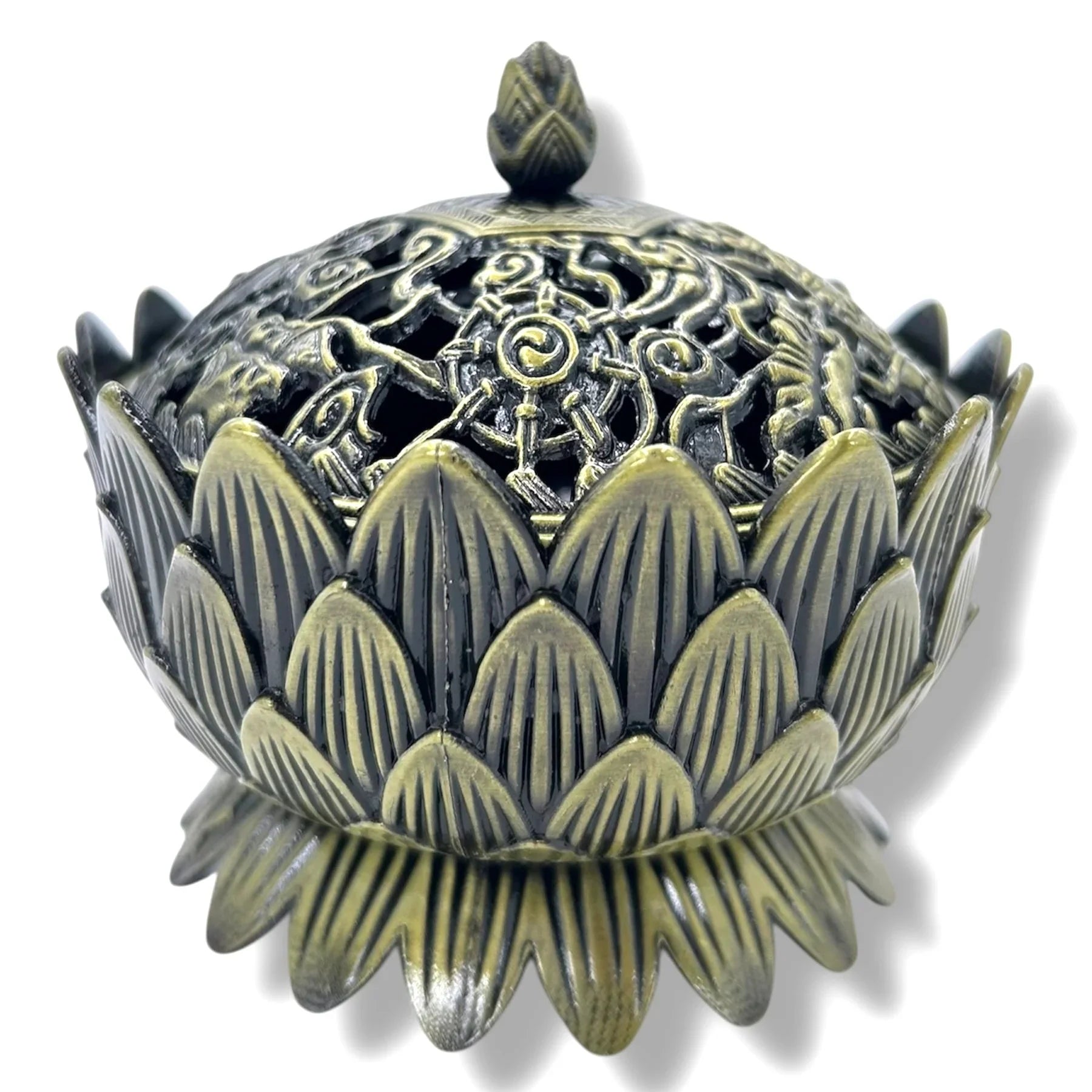 Decorative incense holder with intricate designs on a white background